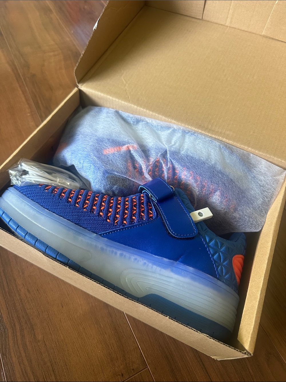 Kids Royal Blue Skate Sneakers with Bright Orange Accents